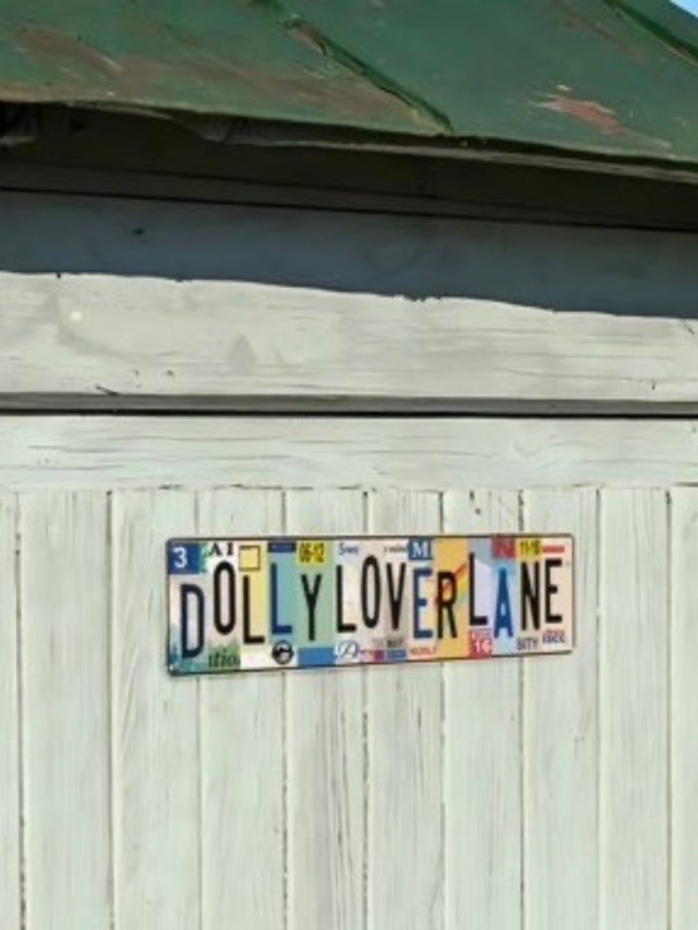 Dolly Lover Lane Metal Tin Sign